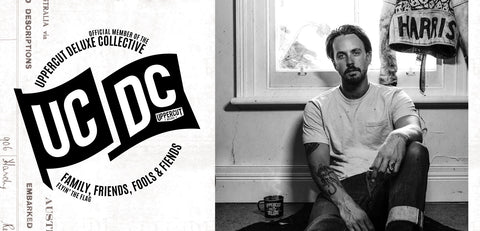 Tim Harris next to UCDC logo