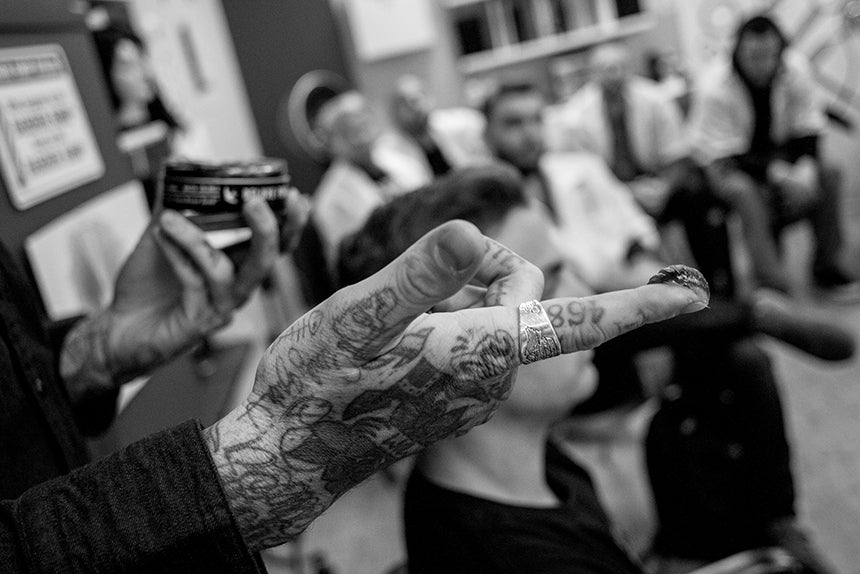 Man showing off Uppercut Deluxe Pomade