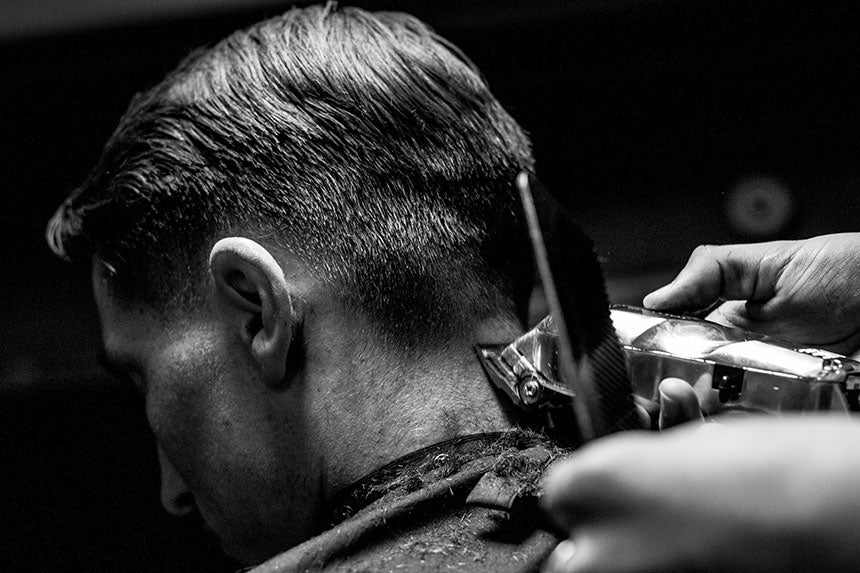 Closeup of man getting a haircut