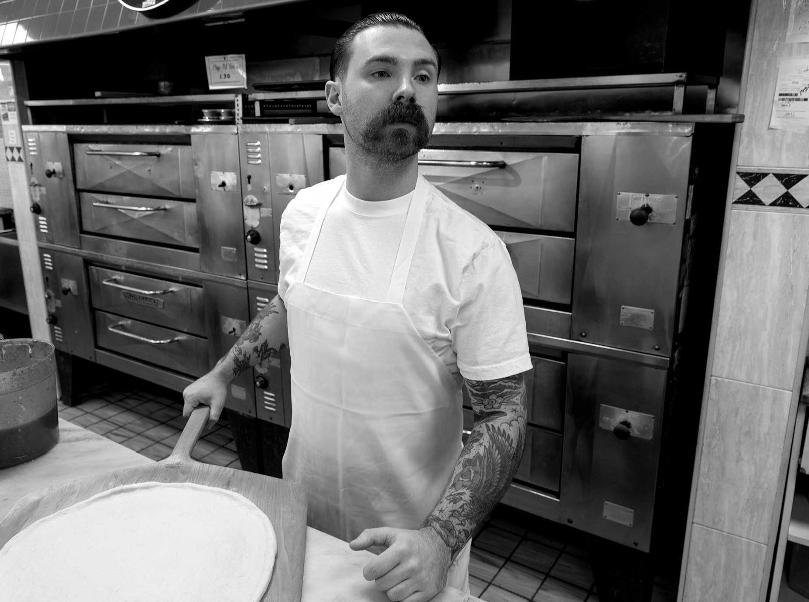 Man preparing pizza