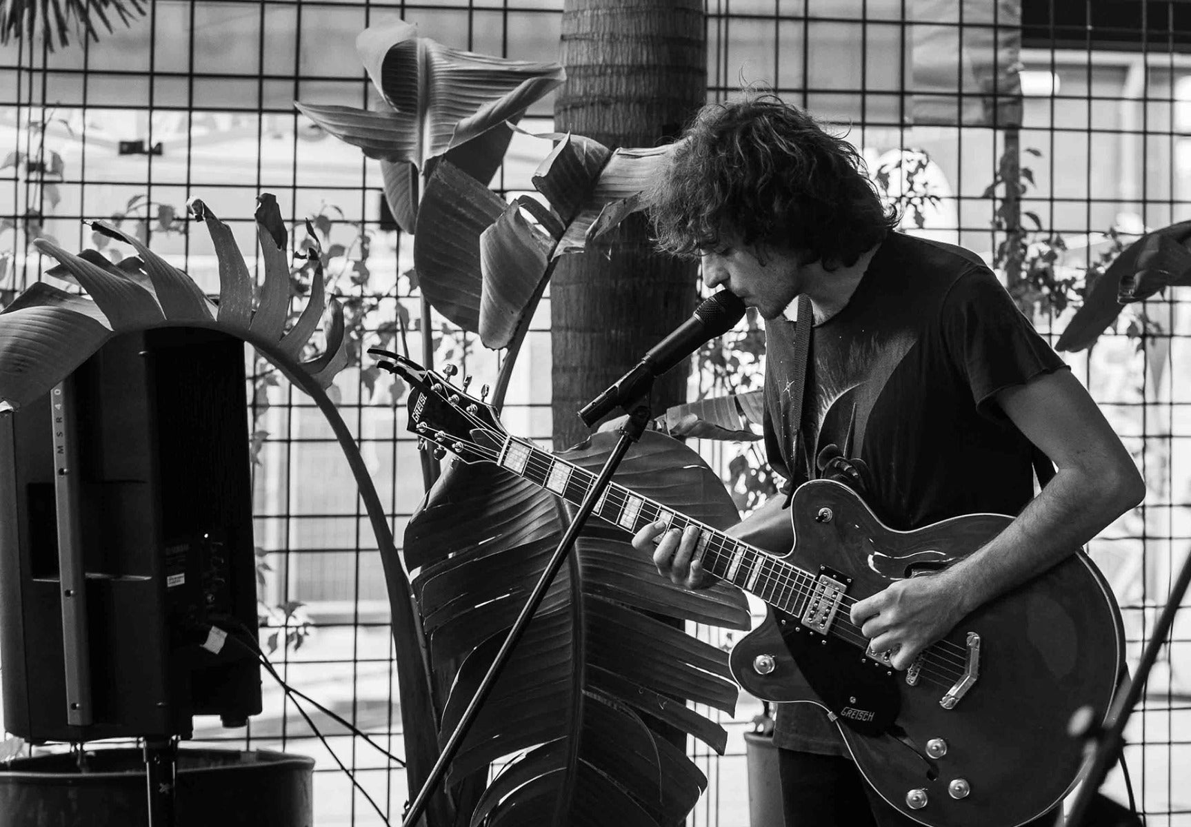 Man performing with guitar