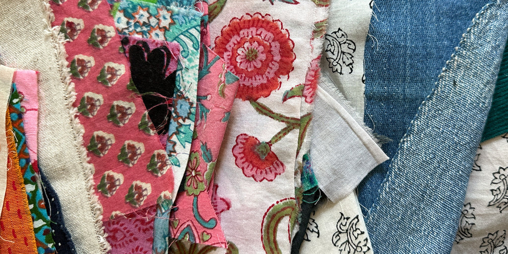 Multiple layers of organic cotton block print fabrics in various beautiful colours 