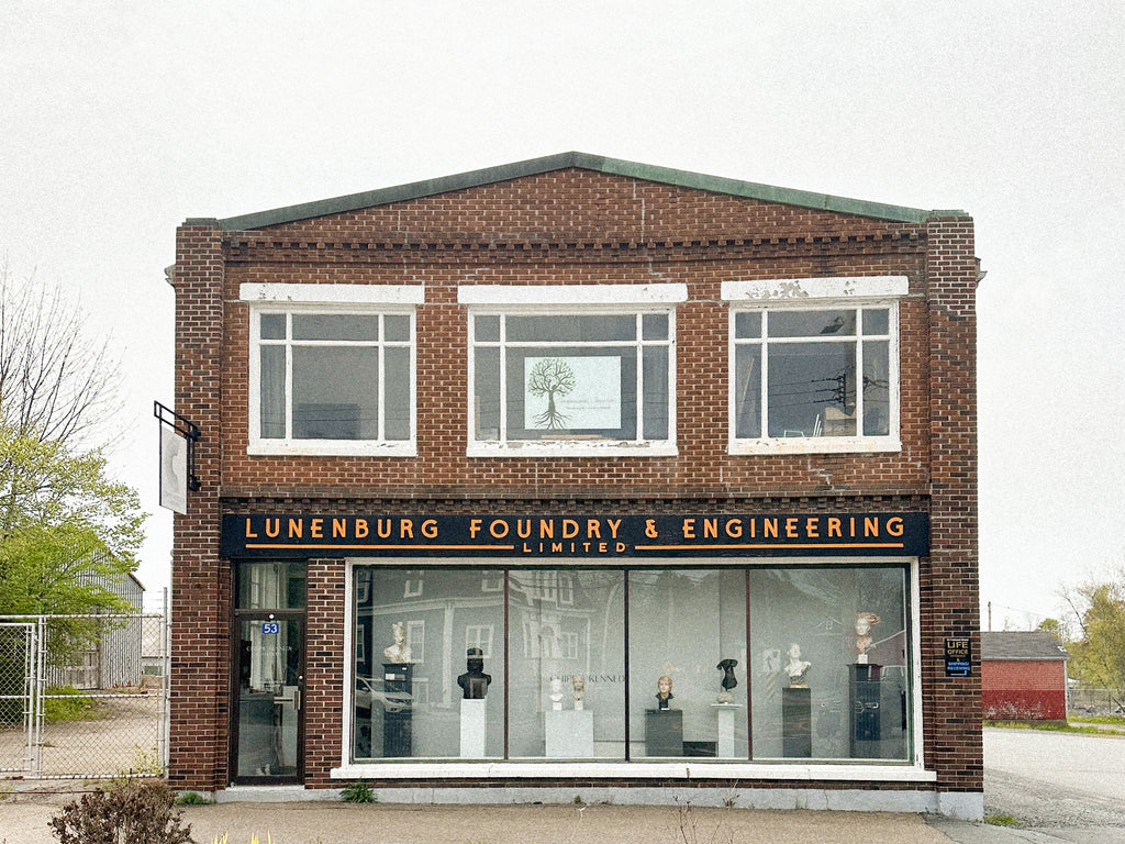 The outside front facade of the Lunenburg Foundry brick building 