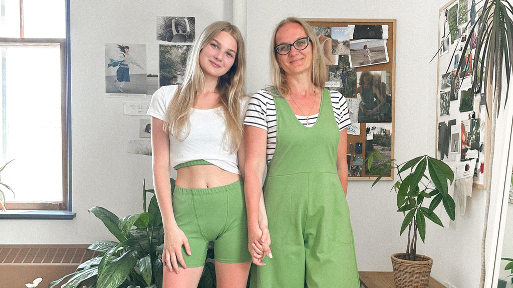 Mother and Daughter holding hands wearing Ana and Zac new summer collection in the studio  