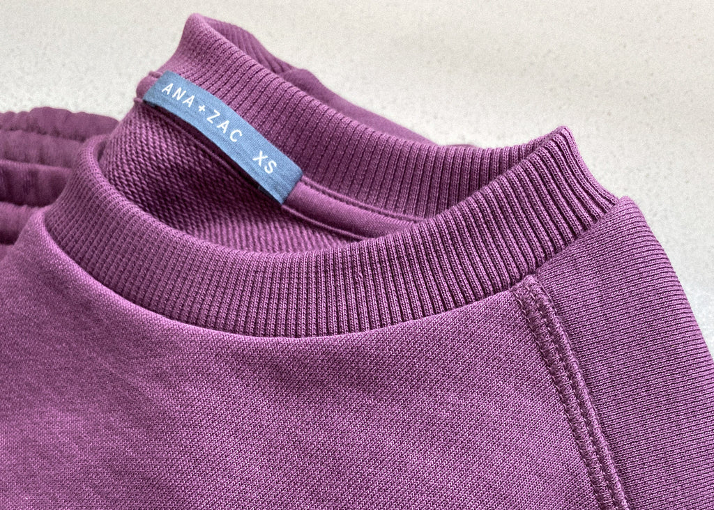 A close up of the Ana + Zac 90s crew that shows that ribbing details around the neck