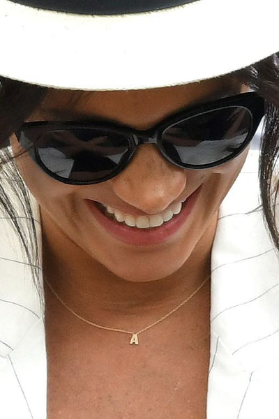 meghan markle wearing initial letter A necklace