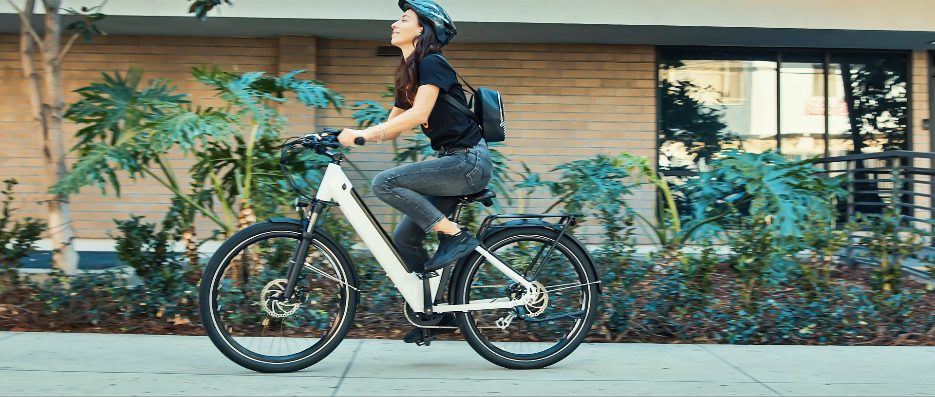 woman riding with an ebike