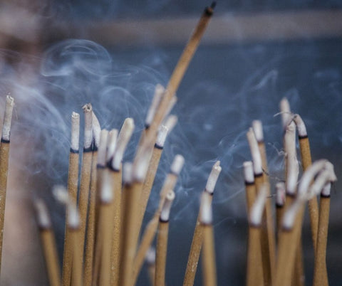 Burning incense sticks image