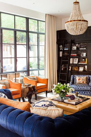 interior of a sitting room with orange armchairs