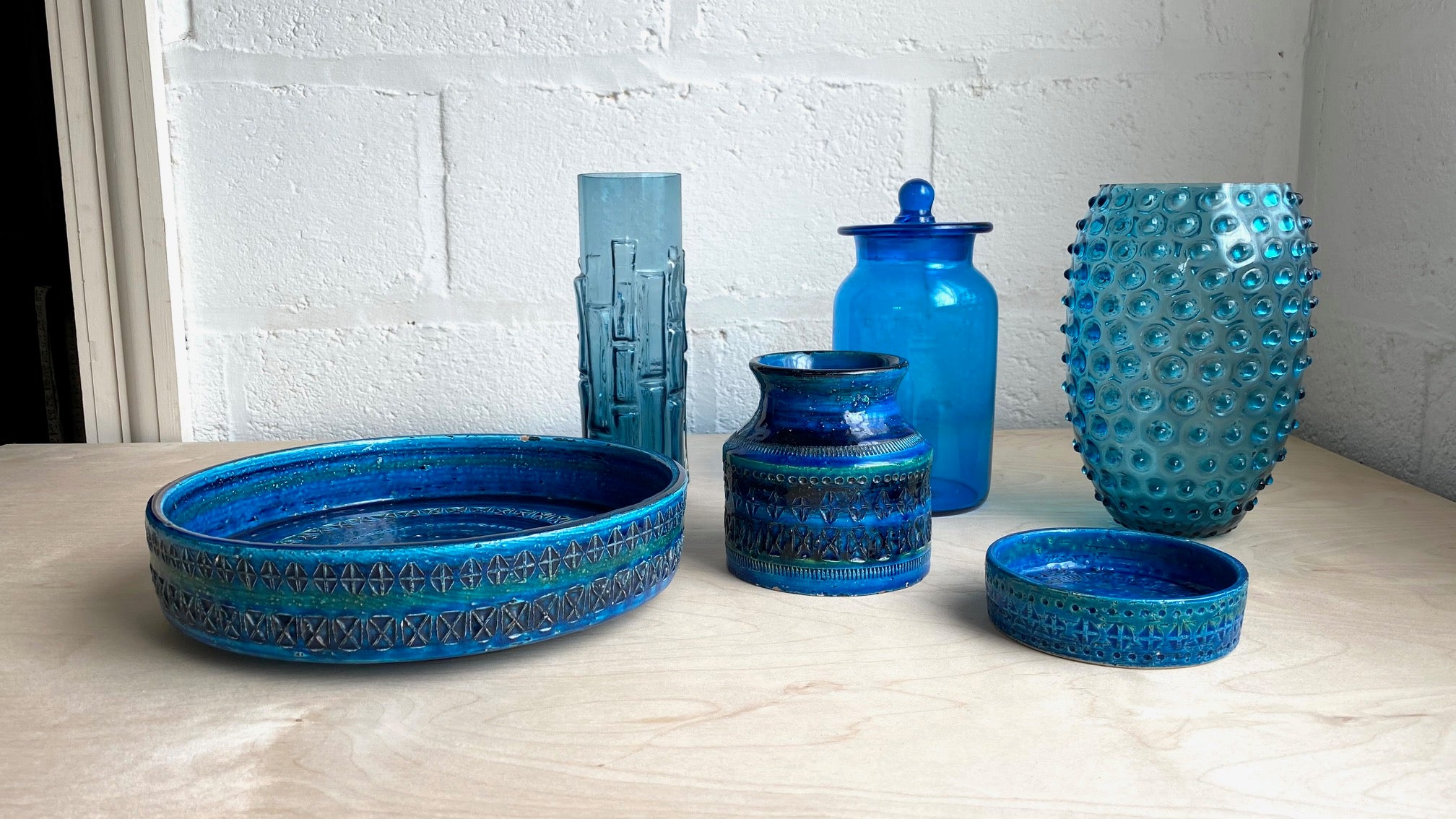 selection of blue vintage glass vases