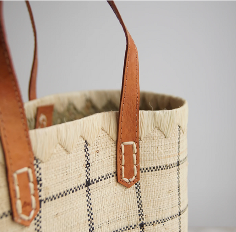 up close raffia and leather basket bag