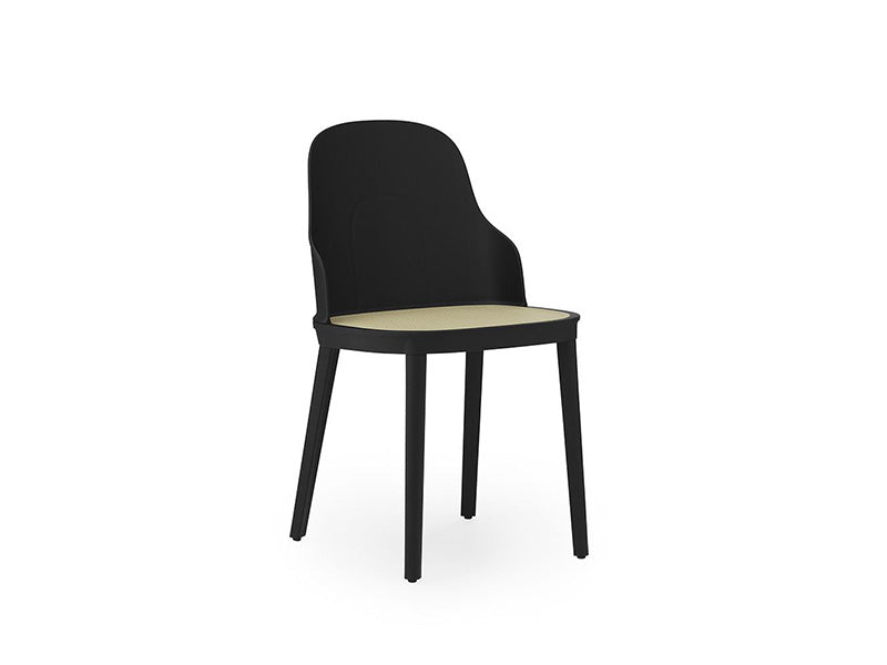 black chair with wicker seat