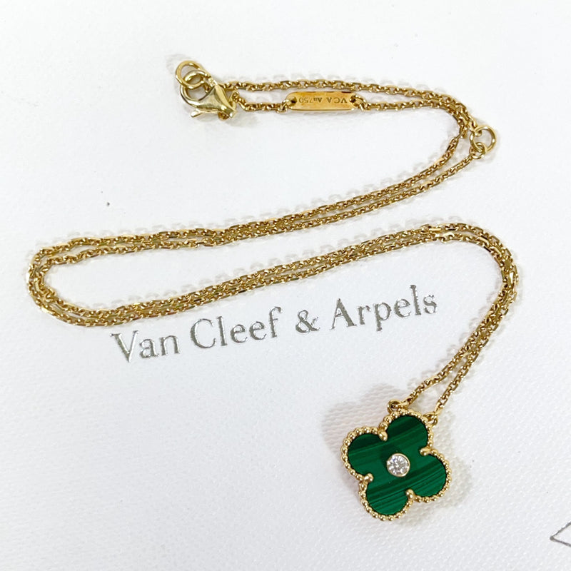 Van Cleef & Arpels, An 18K gold and malachite Magic Alhambra necklace.  Marked VCA, JE472415. - Bukowskis