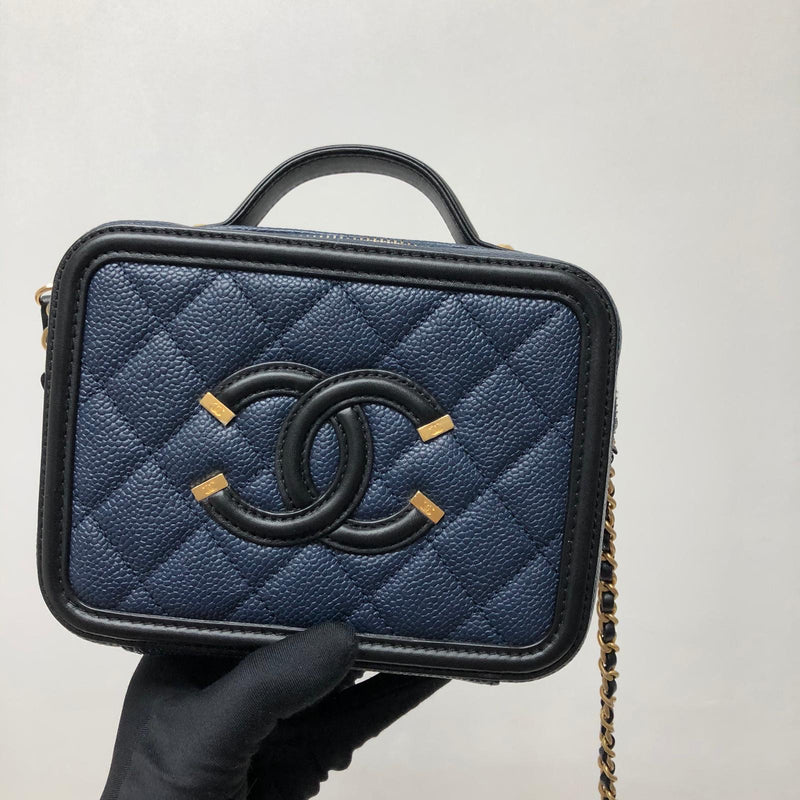 Chanel vanity case  in dark blue open to trades Luxury Bags  Wallets  on Carousell