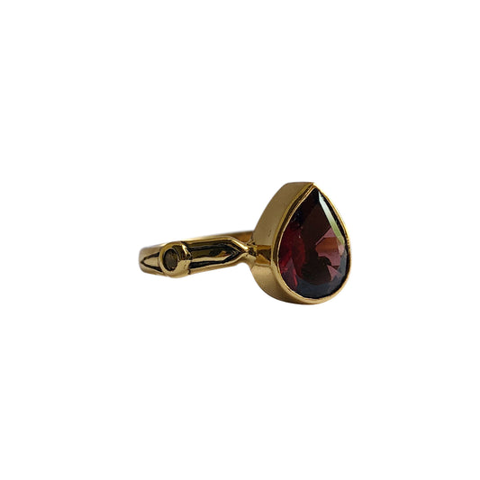 Sacred Solitaire Ring with Garnet