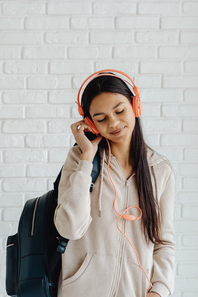 Age to start skincare, girl, listening to headphones