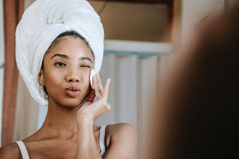 woman-cleaning-face