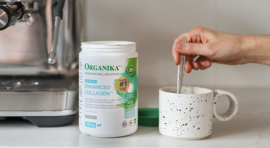 Organika's Enhanced Collagen Original being stirred into a mug