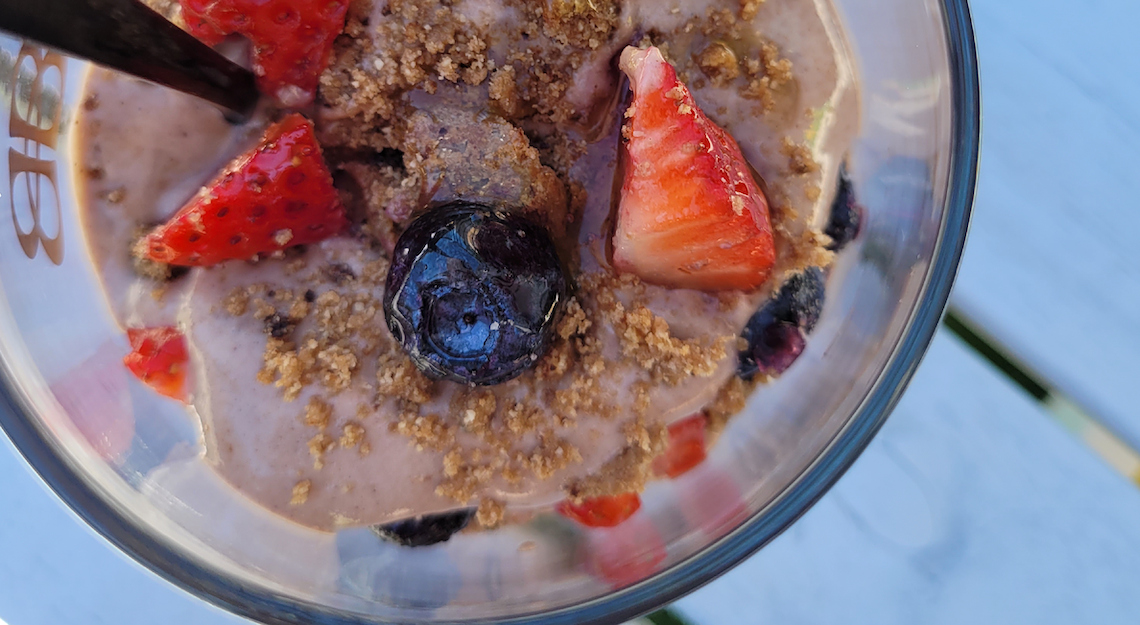 Organika FÄV Chocolate Parfait in a glass with berries