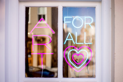 Art for all sign in the window at Miller Gallery 
