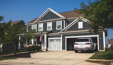 Residential home with car parked outside