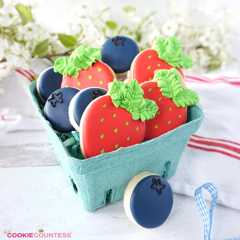 berry shaped cookies in a basket