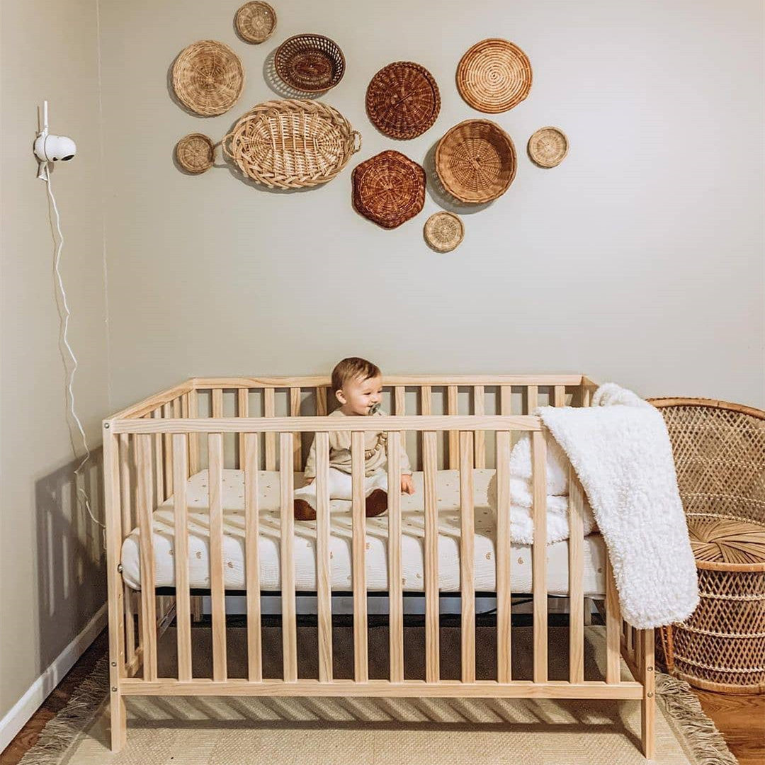 Hidden baby monitor cords in the nursery