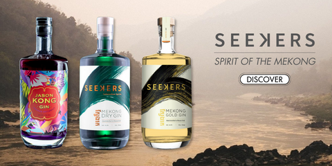 Collection of 3 bottles from Seekers Gin. Jason Kong, Dry, Gold, with a sunset river in the background for online liquor store sale. Spirit of the Mekong