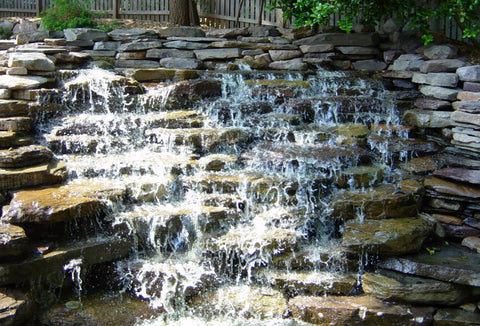 water fall with stone