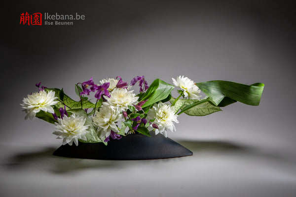 Short and low Ikebana Composition with White flowers