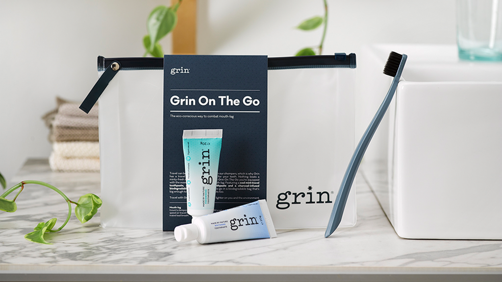 grin natural on the go travel kit toothpaste with flouride biodegracable toothbrush