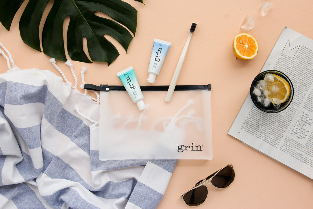 grin natural on the go travel kit toothpaste with flouride biodegracable toothbrush
