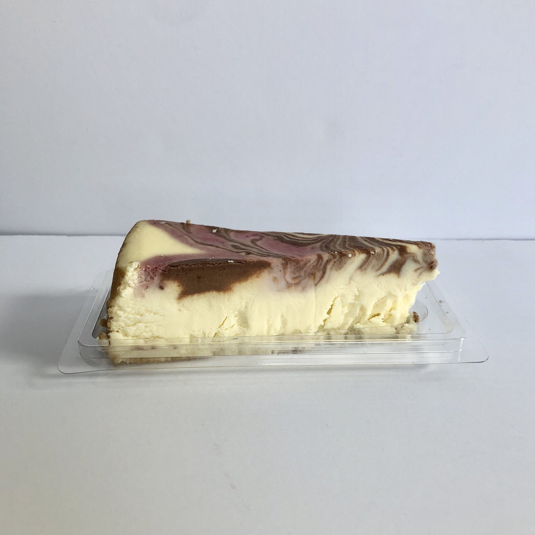 raspberry swirl cheesecake slice