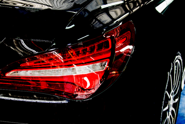 Taillights close-up on a black car