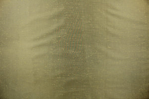  A mock linen in green with hints of gold and a slight shine . 