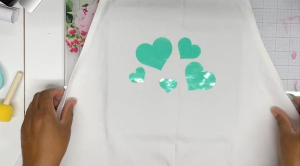 heat resistant transfer mask hearts on apron before transfer