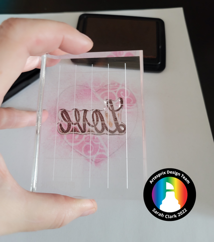 sublimation stamp on acrylic block for sublimation heart ornament project 