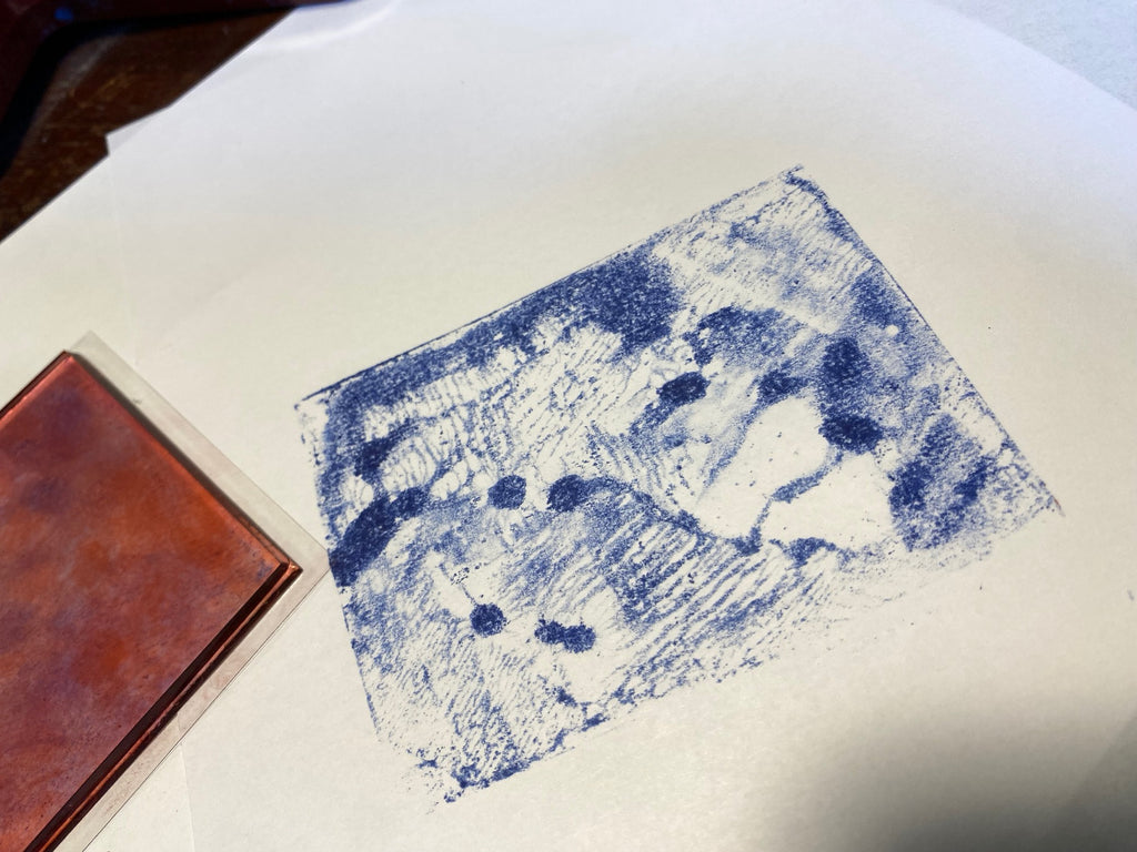 blue Artesprix stamp ink on plain paper