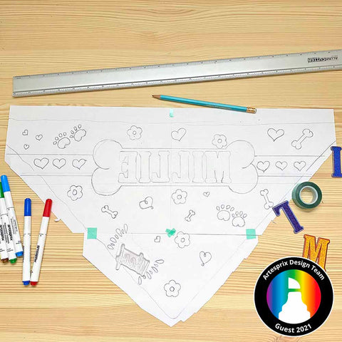 Pet bandana template with design drawn in pencil
