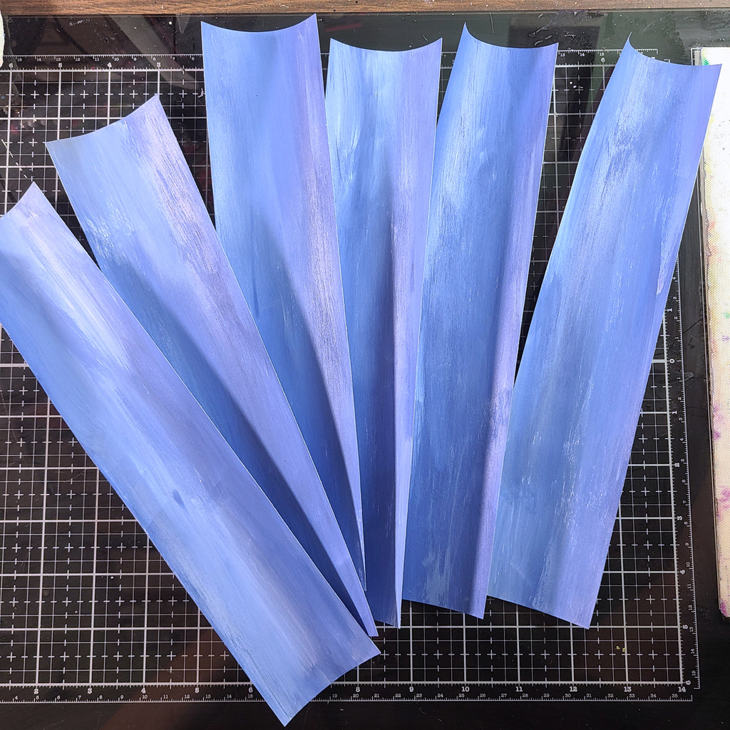 cut pieces of paper with artesprix sublimation paint
