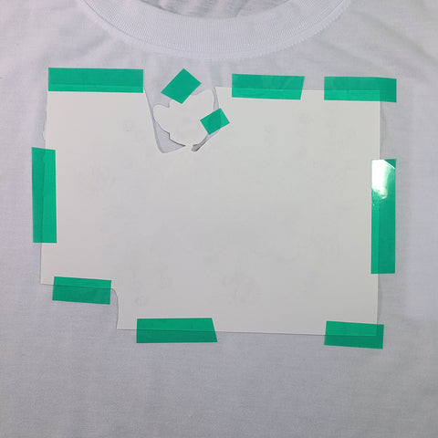 secured design to t shirt with heat tape 