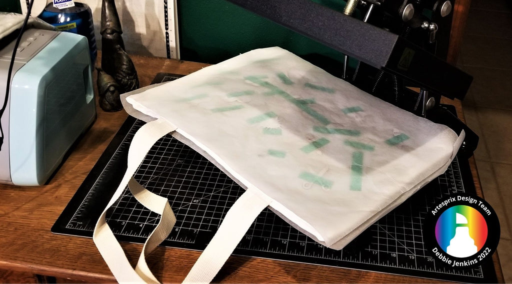 sublimation tote bag in heat press before transfer 