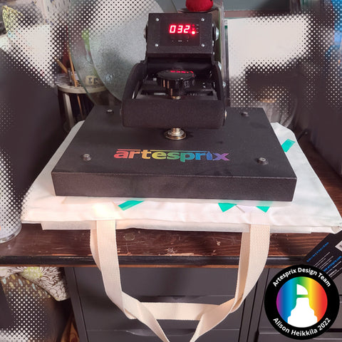artesprix heat press with sublimation tote bag during transfer 