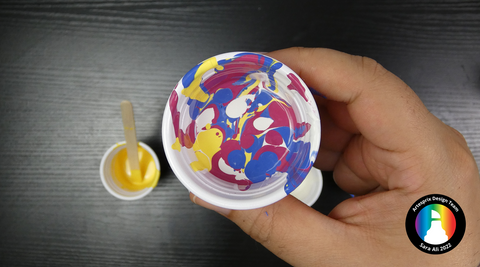 layered sublimation paint in a cup 