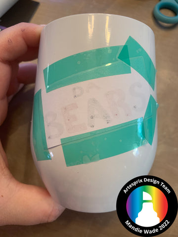 secured artesprix design to sublimation tumbler before transfer 