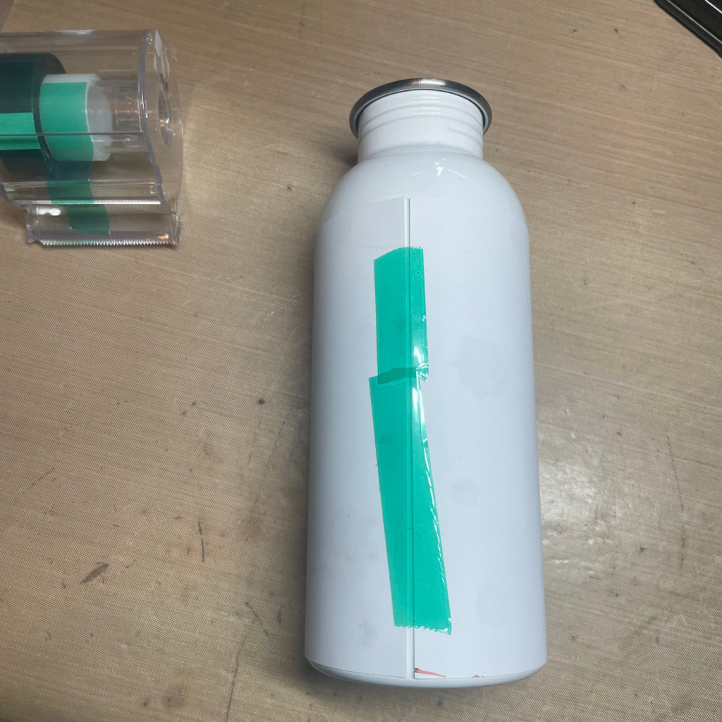 secured artesprix project on water bottle before transfer with heat tape