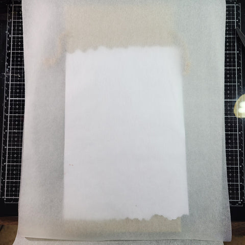 protective paper over secured sublimation design before transfer