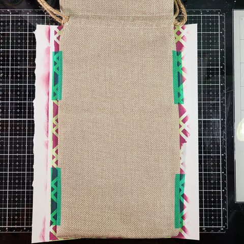 secured wine bag to finished paint design with heat tape 