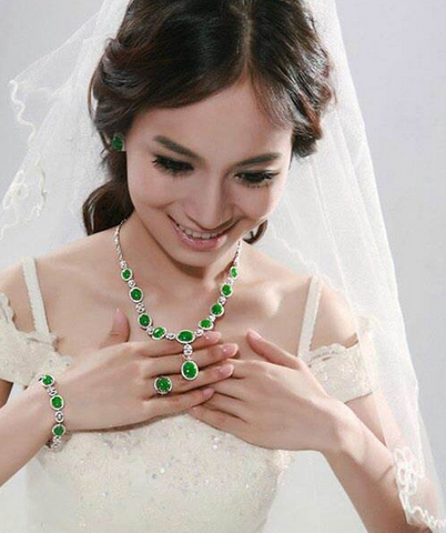 white wedding dress with green jade bridal jewelry