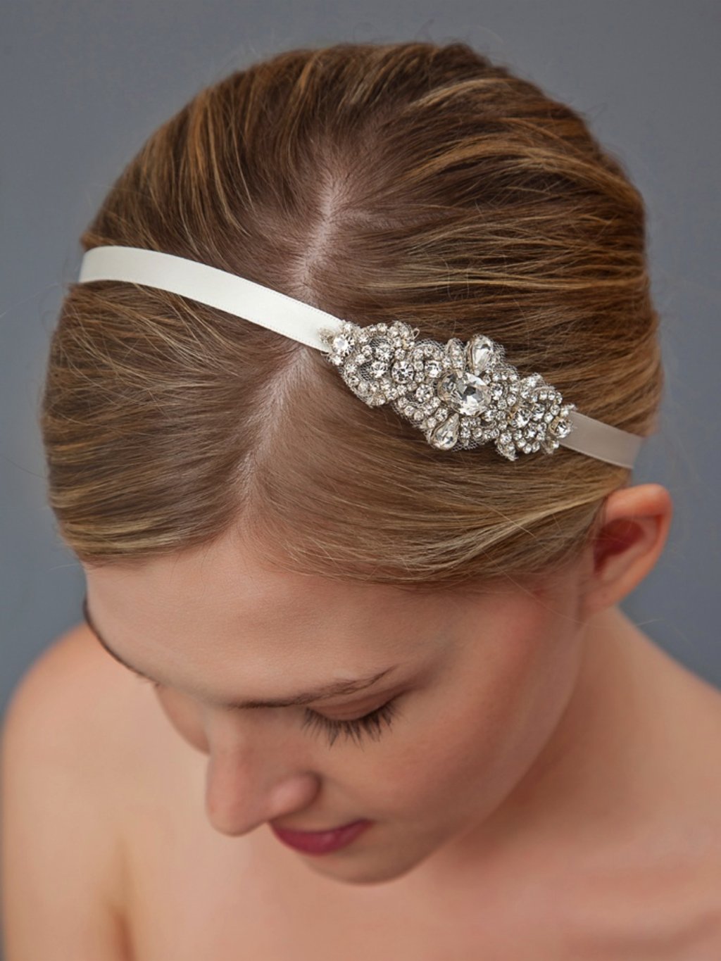 brooch on white hair band